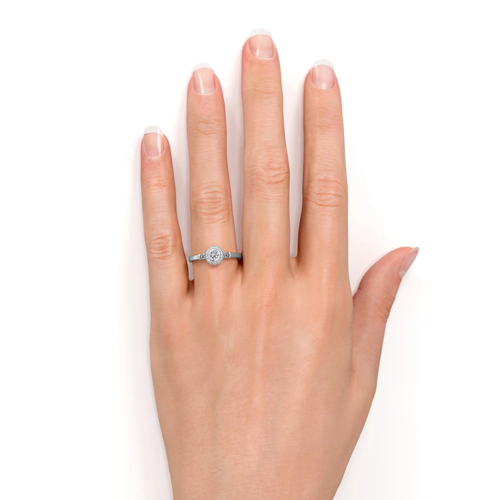 0.63 ct Bezel Set Round Cut Diamond Halo Engagement Ring in 10K White Gold E530470